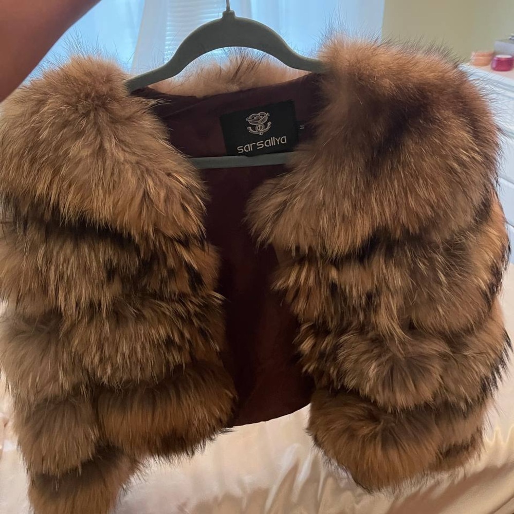 Women’s size M raccoon fur coat, waist length